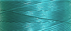 Buy a bobbin of Turquoise Blue Size AA Thread from Lokey’s String Section at House of Greco